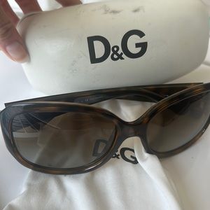 Authentic Dolce & Gabbana sunglasses with bag and case.